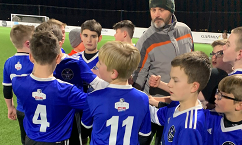 Rovers Huddle Under the Lights